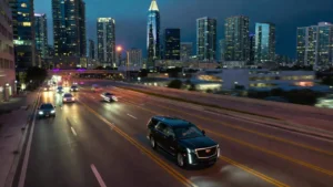 SAL limo suv driving through Brickell at night
